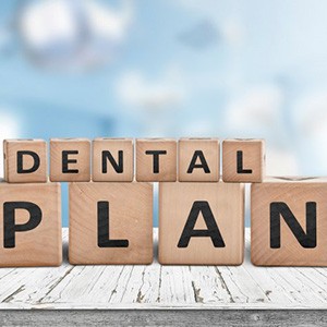 Blocks spell “dental plan”