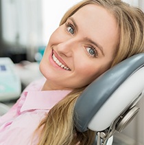 Smiling woman in dental chair