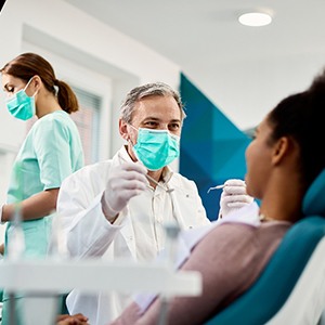 A dentist about to perform a dental checkup