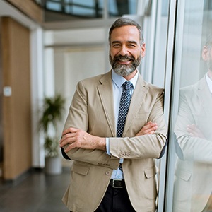 Man smiling in an office