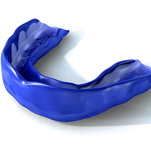Model of a blue athletic mouthguard