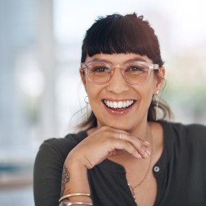 Woman with bright white smile after at home teeth whitening