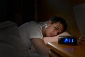 Man suffering from sleeplessness.